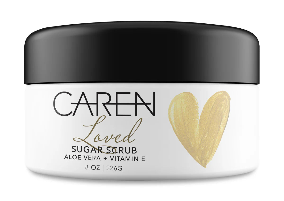 Jar of Garen Loved Sugar Scrub with black lid and gold heart design on a white background