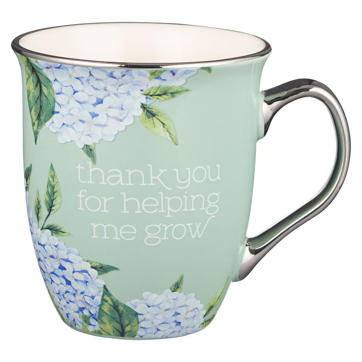 Mug with floral design and 'thank you for helping me grow' text on a light green background