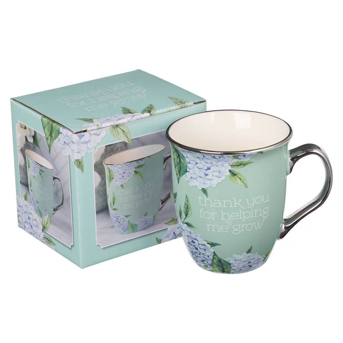 Mug with floral design and text 'thank you for helping me grow' in a matching box.