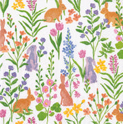 Pattern of rabbits and flowers on a white background