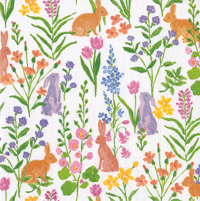Pattern of rabbits and flowers on a white background