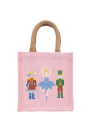 Pink tote bag with fairy tale character illustrations on a white background