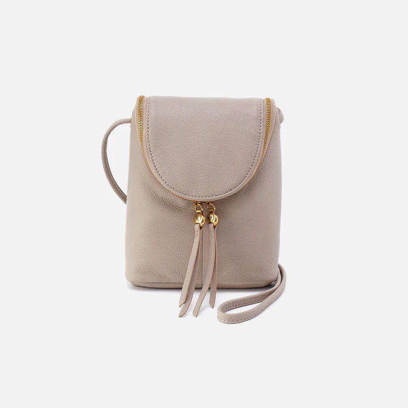 Beige crossbody bag with a strap on a white background