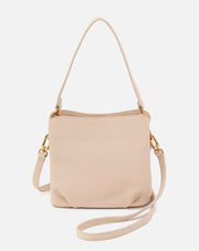 Beige handbag with a strap on a white background