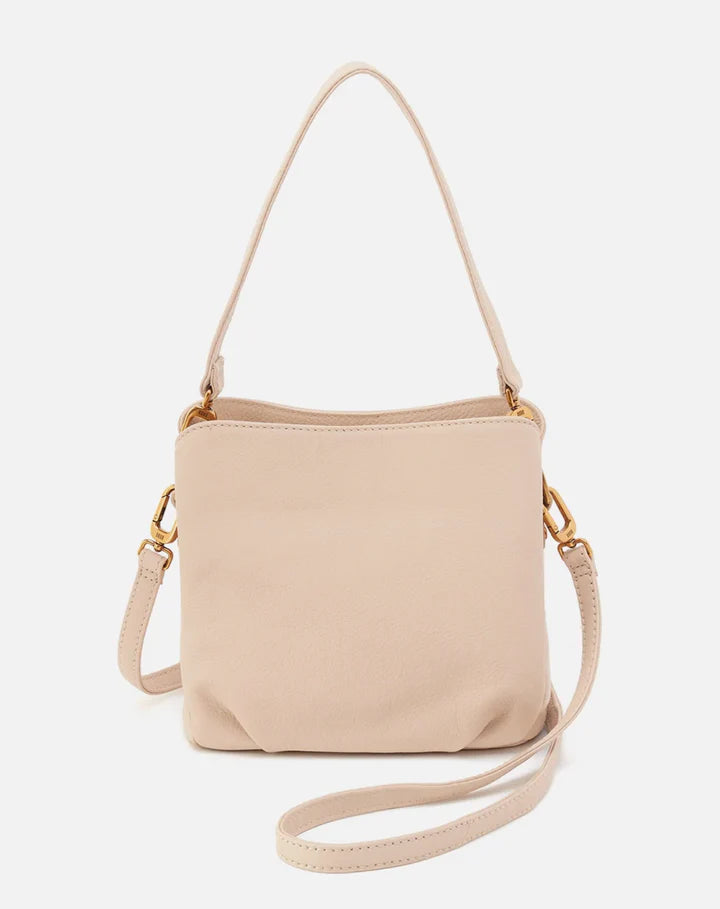 Beige handbag with a strap on a white background