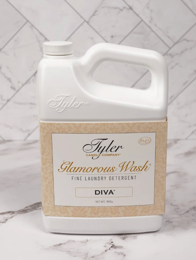 Tyler Glamorous Wash Diva laundry detergent container on a marble surface