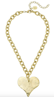 Gold heart-shaped Susan Shaw pendant necklace on a white background