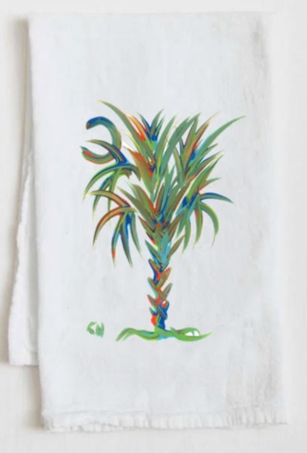 Calmettos White kitchen towel with a colorful Emerald Coast palm tree design on a white background