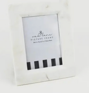 White 8 Oak Lane white marble picture frame with black text on a white background