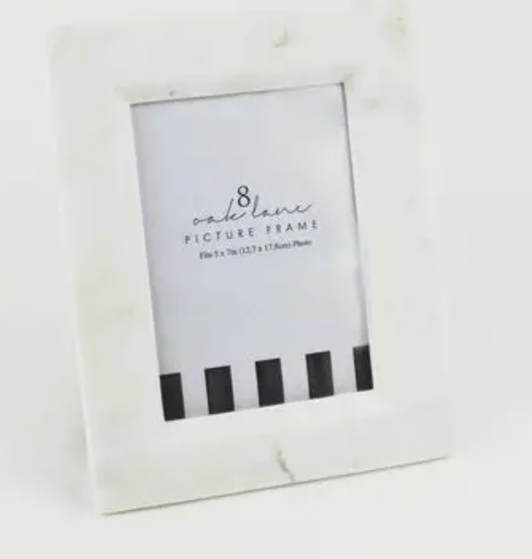 White 8 Oak Lane white marble picture frame with black text on a white background