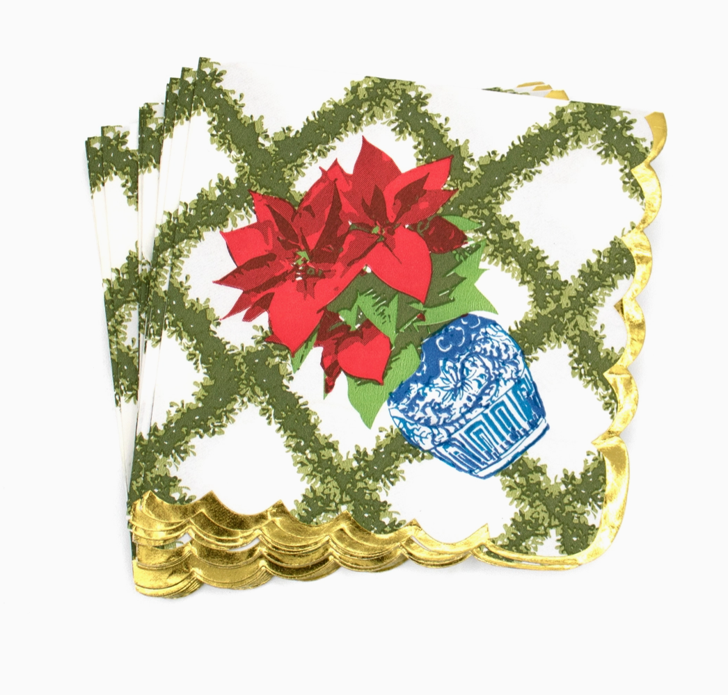 Decorative Christmas 8 Oak Lane Cocktail napkins with red poinsettias , a  green trellis. pattern and a blue vase on a white background with gold leaf effect scallop edge