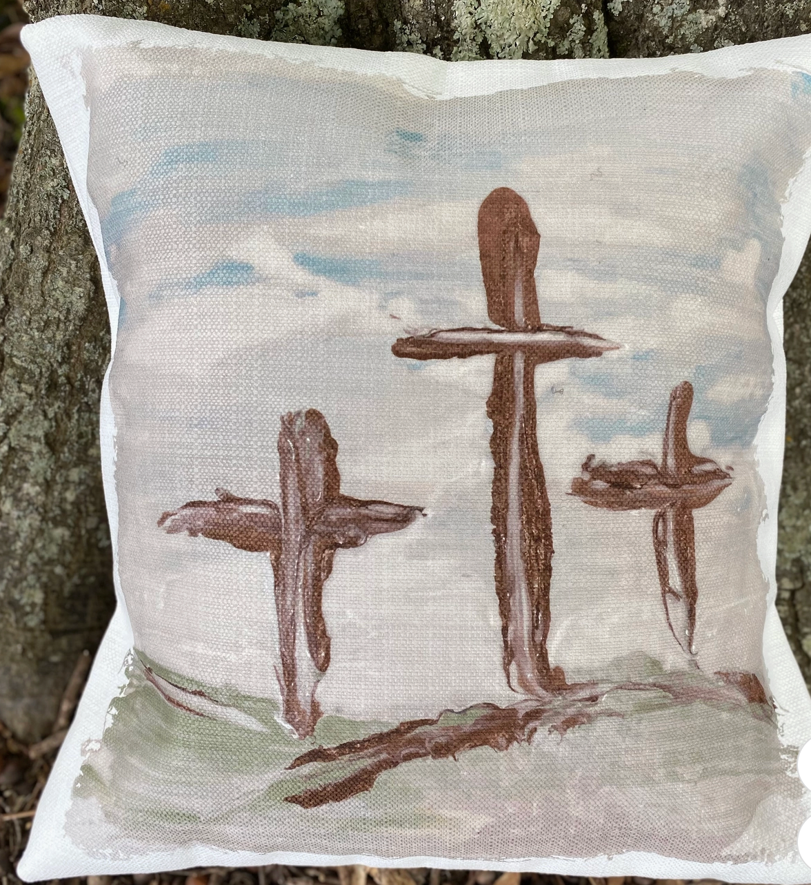 Decorative Southern Cotton Mill brand Calvary Pillow with 3 handpainted crosses  against a natural background