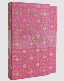 A pink Anna Griffin brand hardcover notebook or journal with a textured cover decorated with gold floral and vine patterns, shown against a plain white background.