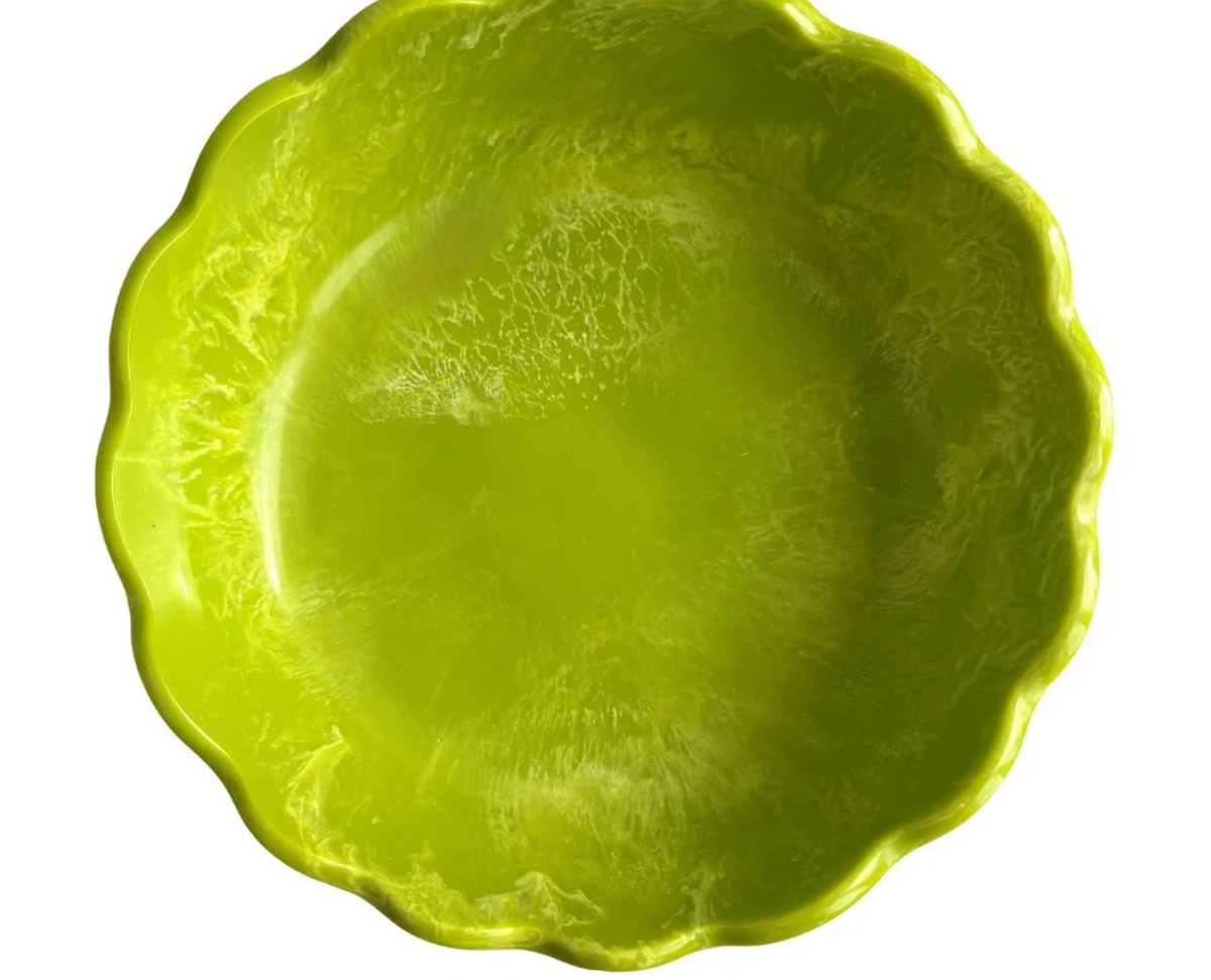 A bright lime green Laura Park Brand Green resin scalloped bowl shown from a top-down perspective on a white background.