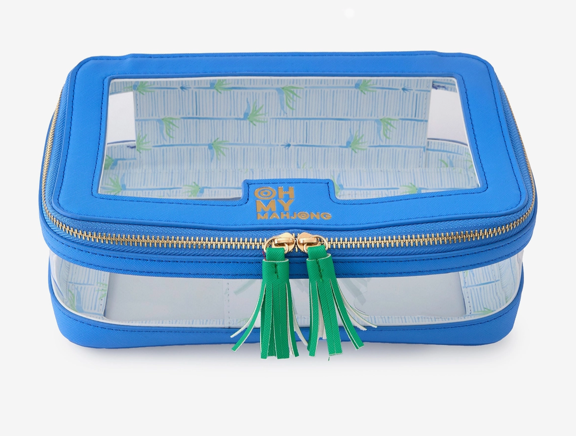 Closed bag: “Blue Mahjong tile storage bag with clear panels, green tassel zipper pulls, and a gold-tone zipper