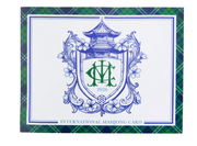 “2026 International Mahjong Card with a green and navy plaid border, blue pagoda floral crest, and green monogram.”