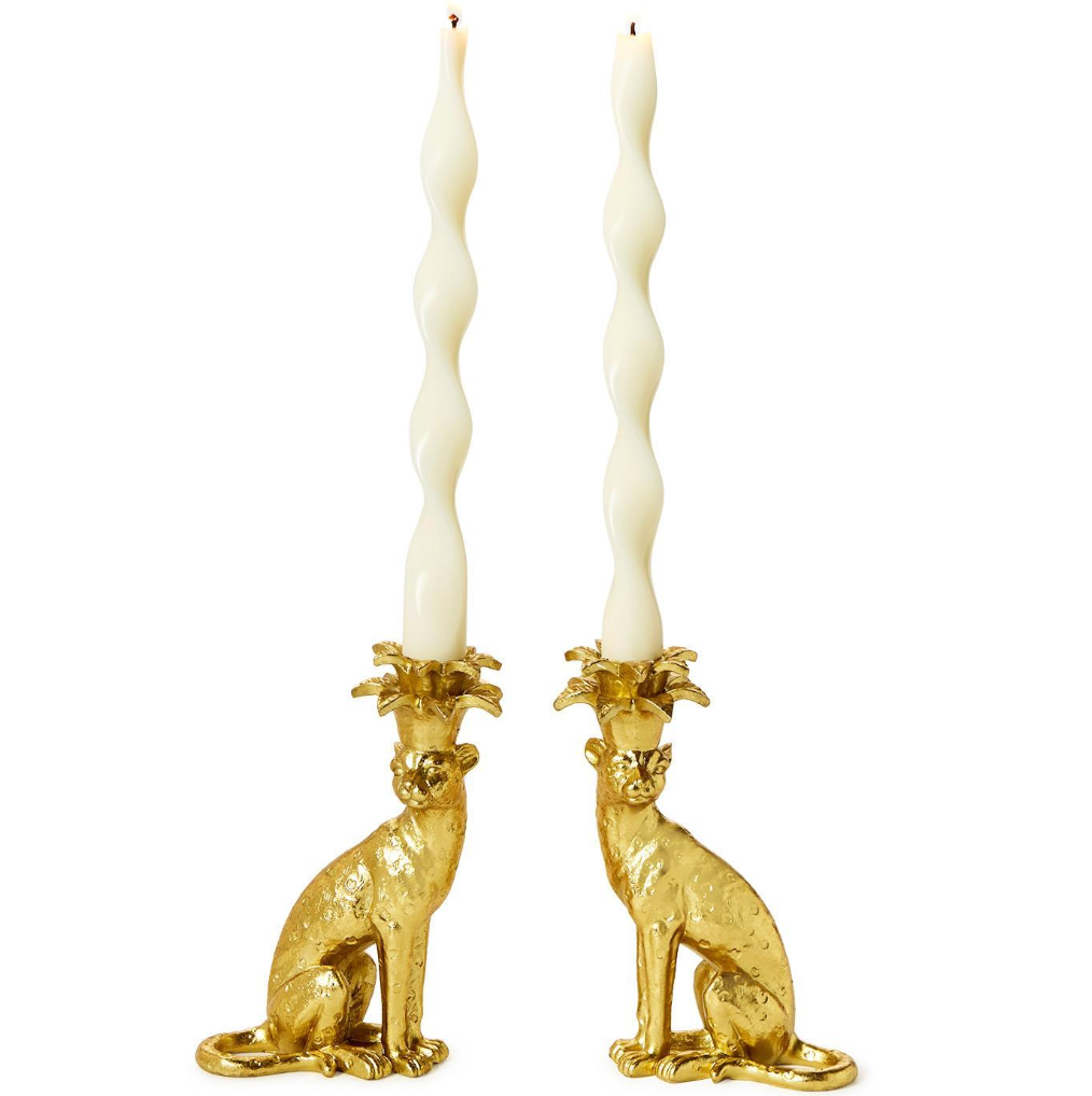 Gold Leopard Candle holders with white candles on white bacground