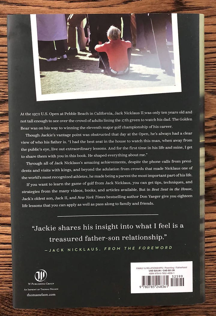 Back of the Book, "Best Seat in the House" on a wood table