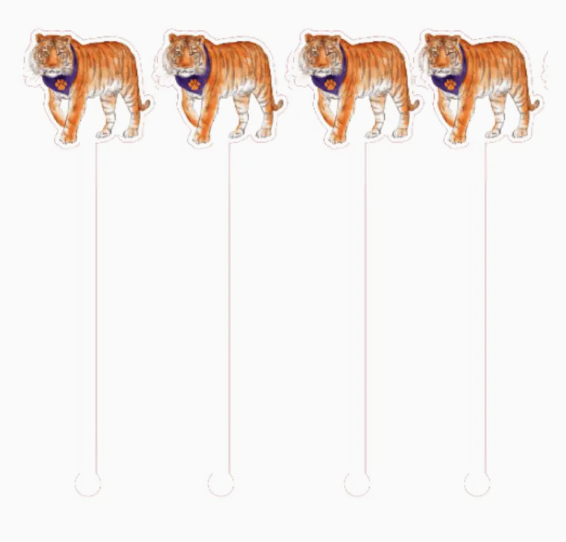 Four tiger-shaped drink stirrers on white sticks with a white background.