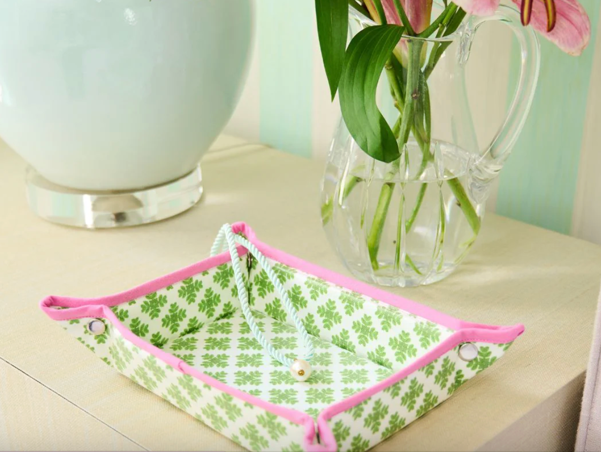 Laura Park Designs Brushstrokes Green waxed cotton Snap Tray on a table next to a flower vase – waxed cotton decorative tray for home entertaining