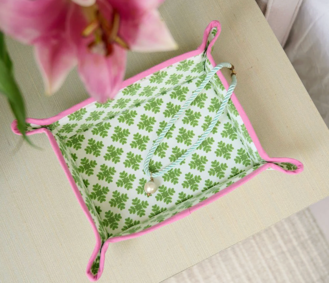 Laura Park Designs Brushstrokes Green waxed cotton snap tray with green floral brushstroke pattern on a light surface