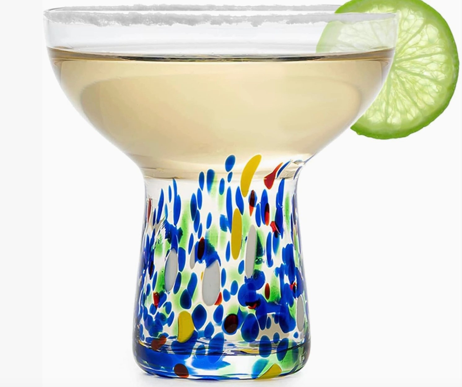 One glass with confetti colorful design in the stem and a bowl top with drink and lime slice on white bakground on a white background