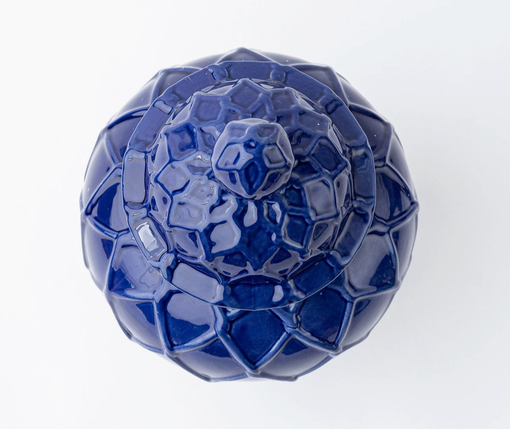 The top iew of the 8 Oak lane brand Blue ceramic Ginger Jar with geometric design on a white background