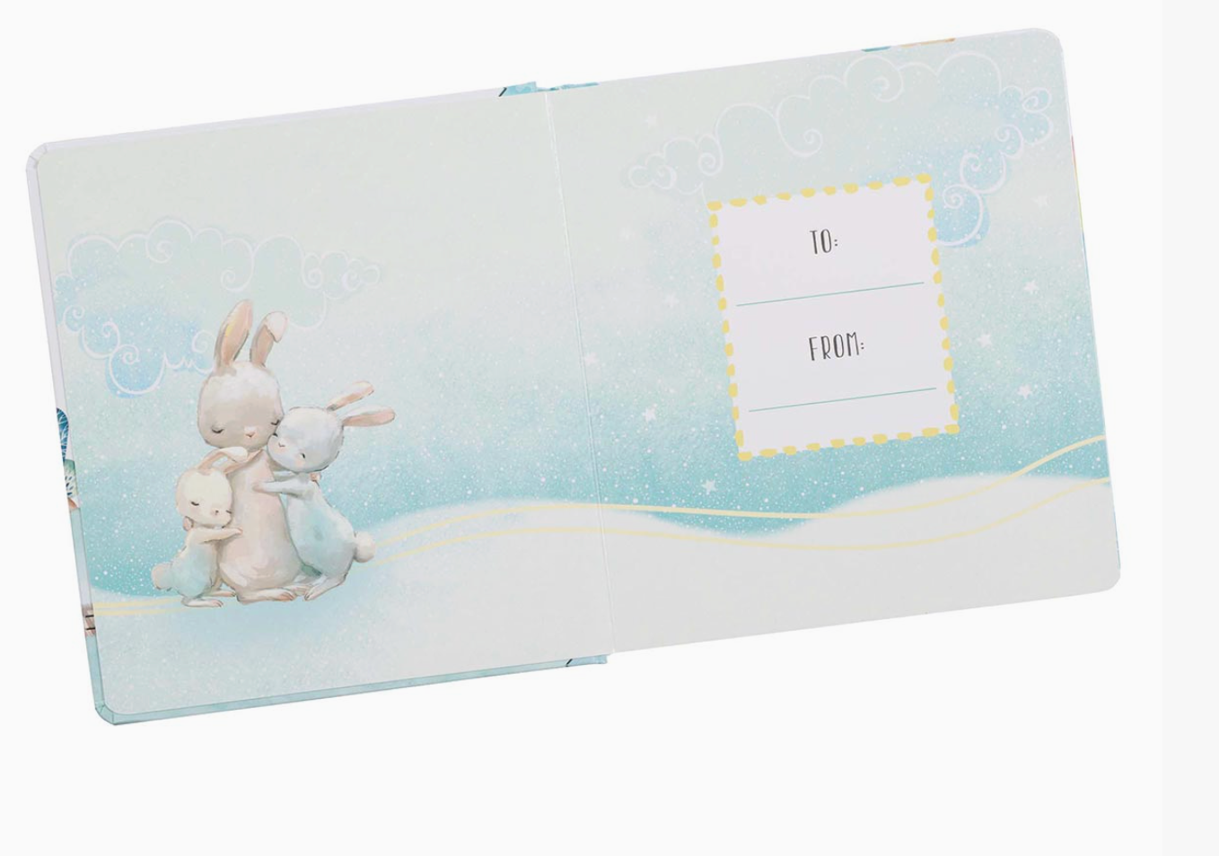 Children's book "My Lulabible for Boys" open to a blue and white page with bunnies and writing on a white background. Author is Alette-Johanni Winckler with two rabbits and a bear on a snowy background