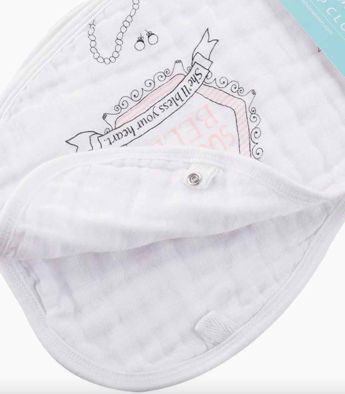 Close-up of Little Hometown Brand Southern Belle design on soft cotton baby bibm with pink and white text and graphics on a white background