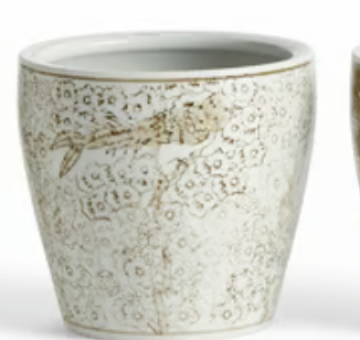 A Napa Home and Garden small ceramic cachepot or candle holder with a textured off-white glaze and a brown fish illustration, shown against a plain white background.