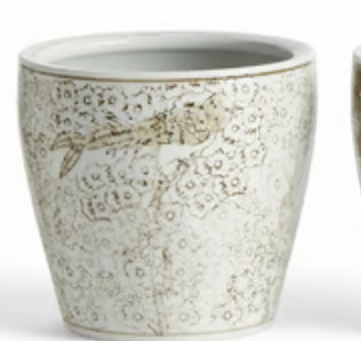 A Napa Home and Garden small ceramic cachepot or candle holder with a textured off-white glaze and a brown fish illustration, shown against a plain white background.