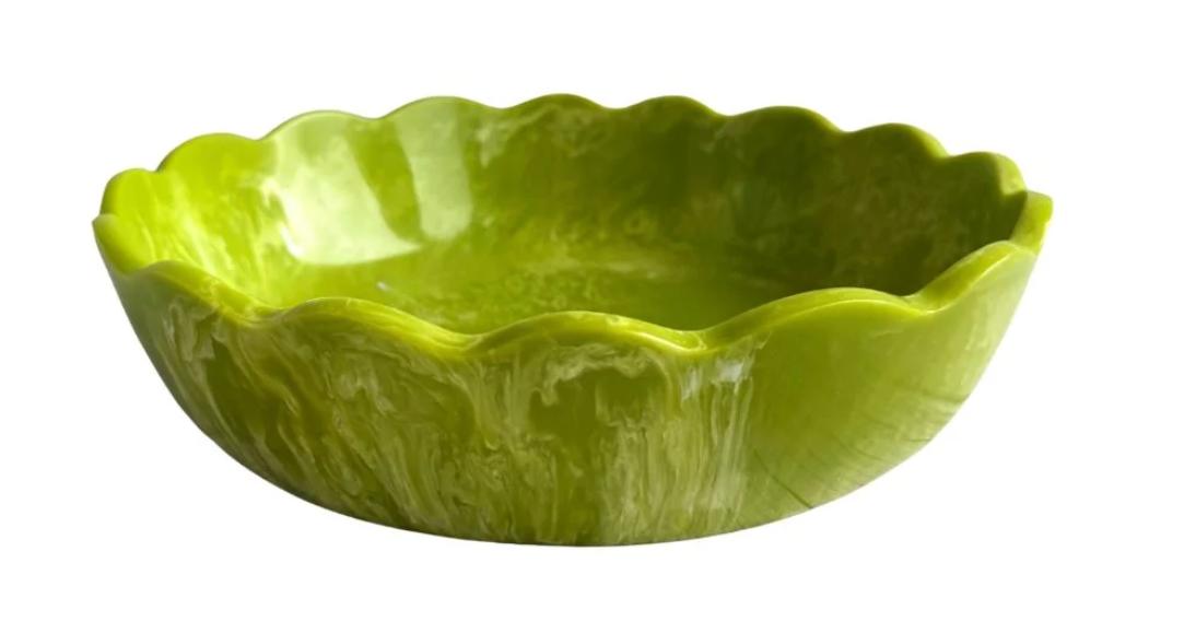 Laura Park Brand Green resin scalloped bowl on white background
