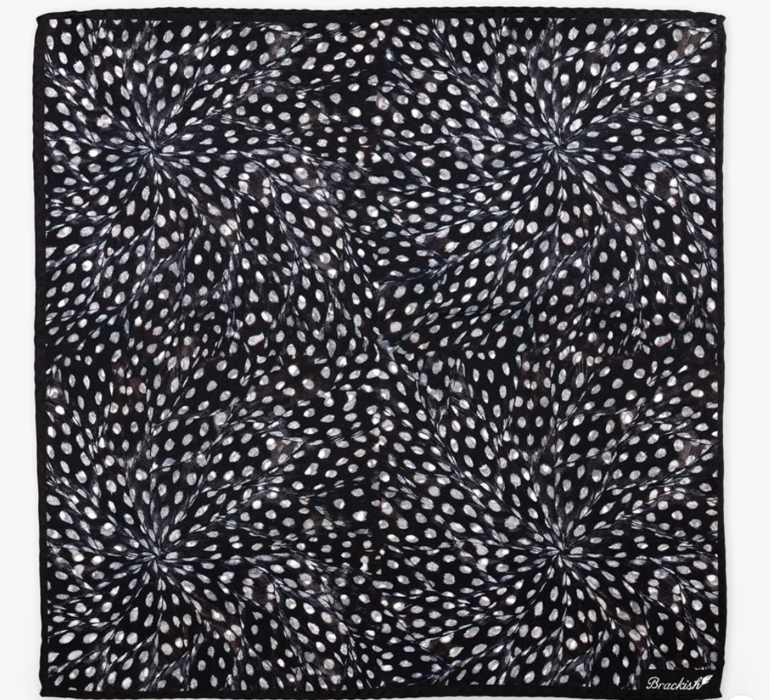 Silk Brackish brand scarf for pocket square with guinea feather design in black, white and blue on white background