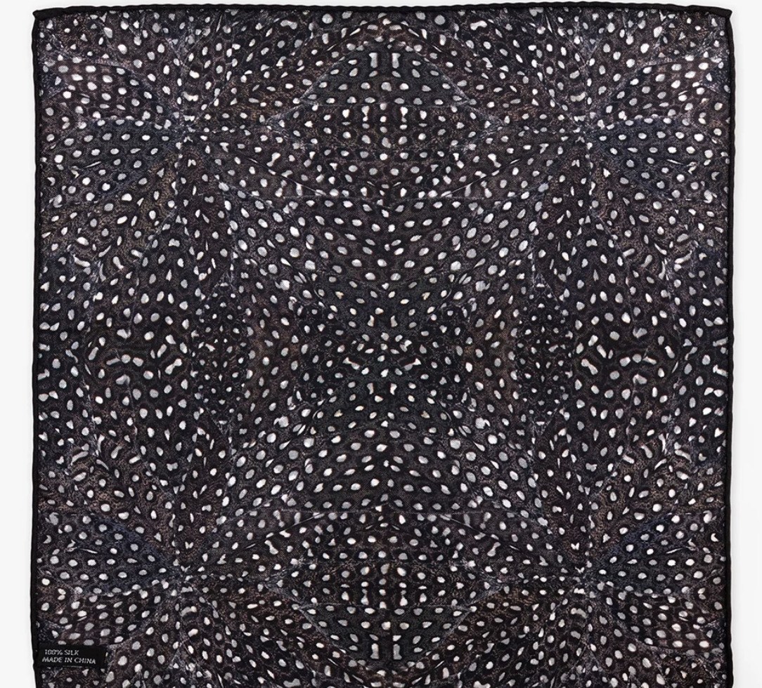 Silk Brackish brand scarf for pocket square with guinea feather black, white and brown design on white background