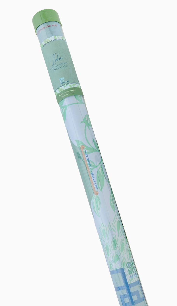 Oh My Mahjong Isla mat rolled inside a clear storage tube with a green cap and coordinating label.