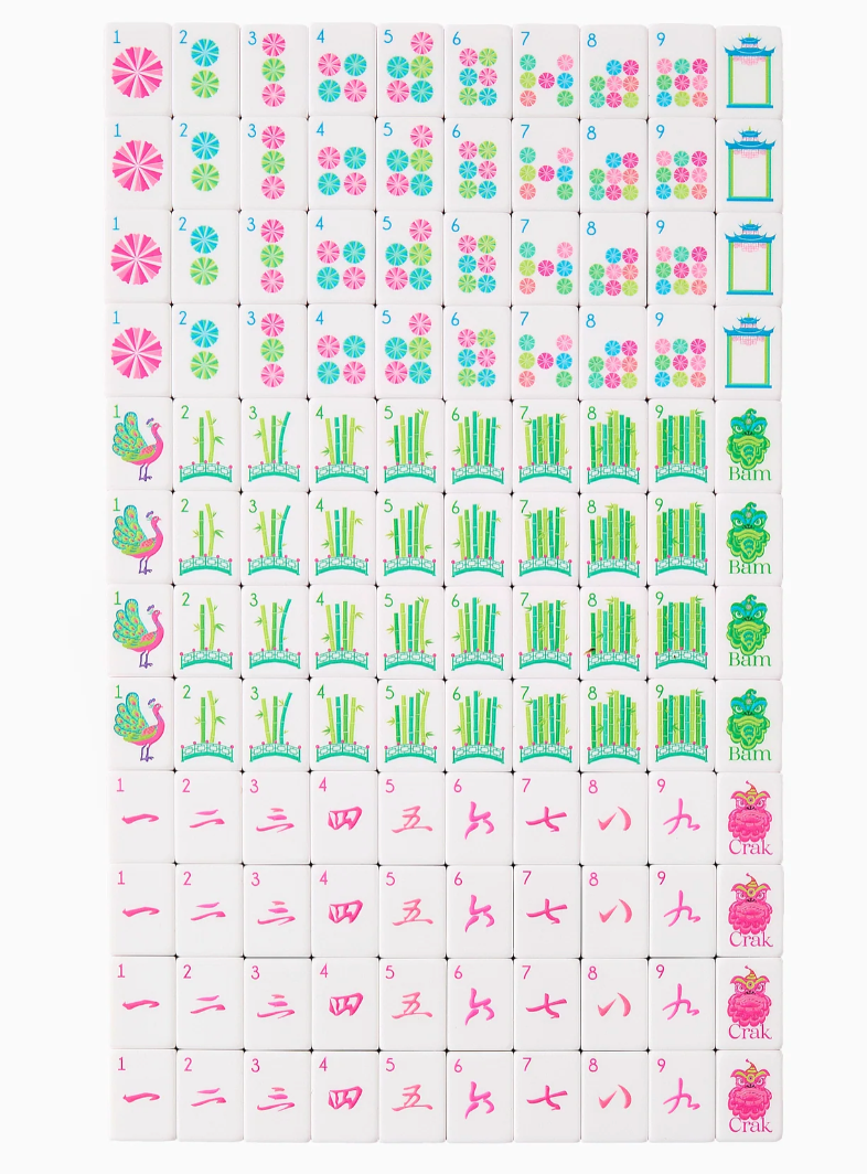 Glow Wild mahjong tiles arranged in rows showing colorful Dots, bamboo Bams, pink Cracks, and Dragon designs.