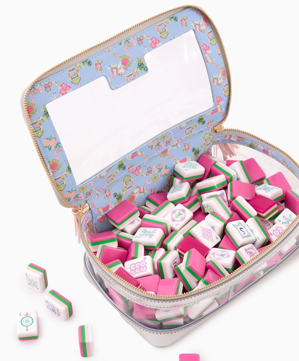 Oh My Mahjong Amara tiles inside an open clear-sided storage bag with pale blue patterned lining.