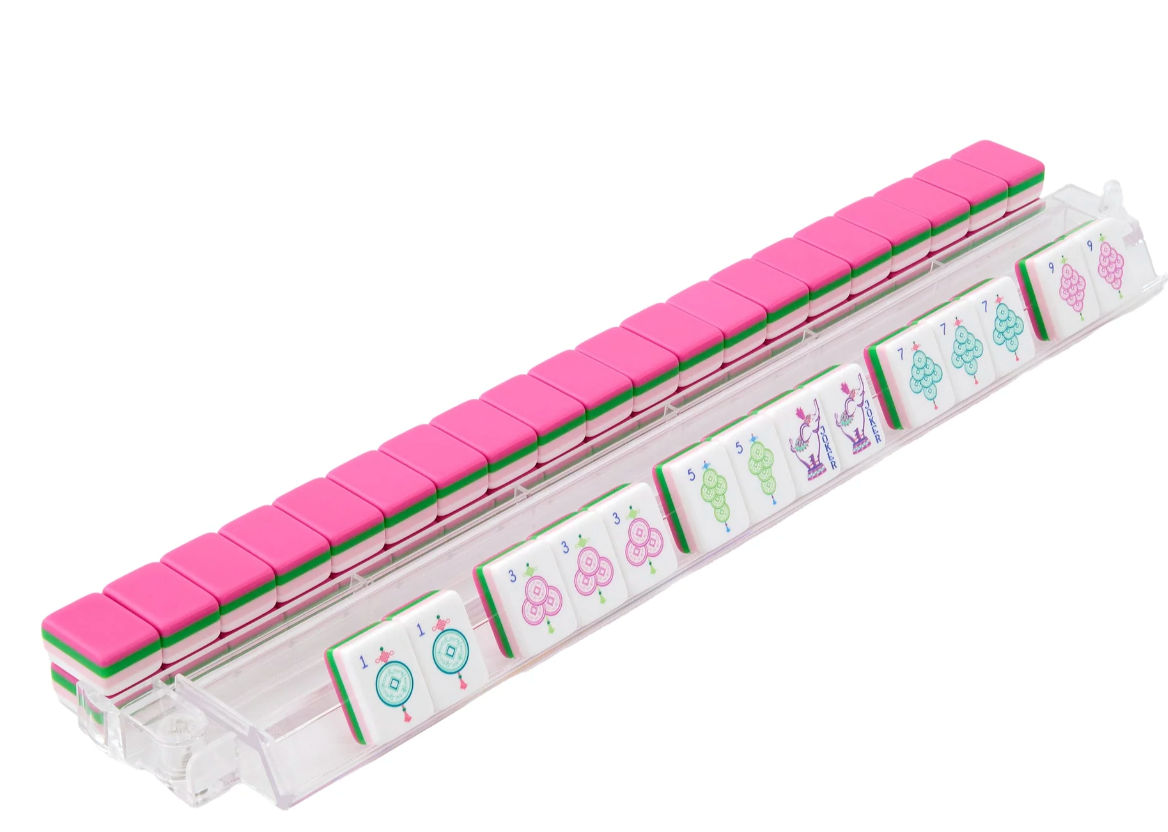 Oh My Mahjong Amara tiles on clear racks, showing pink backs, green layers, pastel Dot tiles, and elephant Jokers.