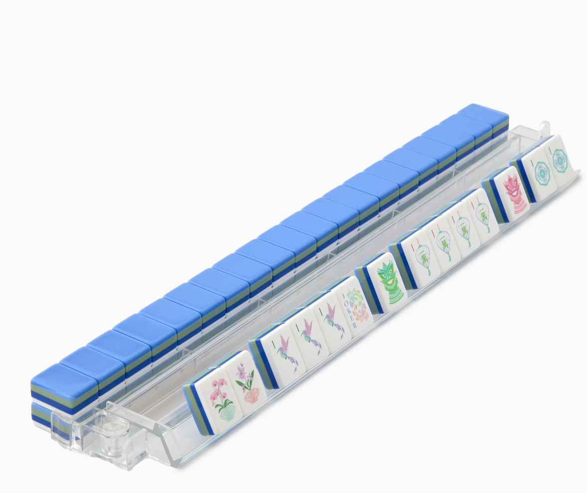 Oh My Mahjong Moonlight tiles on clear racks, showing blue backs, green and blue layers, and pastel illustrated faces.