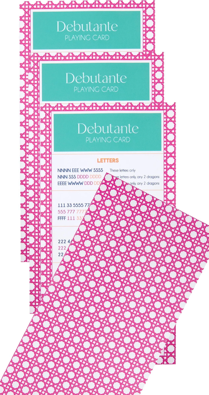 Oh My Mahjong Debutante playing cards with turquoise headings and pink lattice-patterned borders and backs.