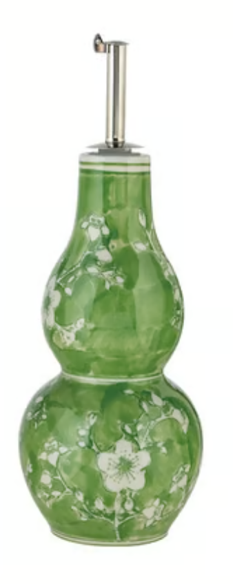 Hand-painted stoneware oil cruet with green-and-white floral pattern, double-gourd body, and stainless steel pour spout