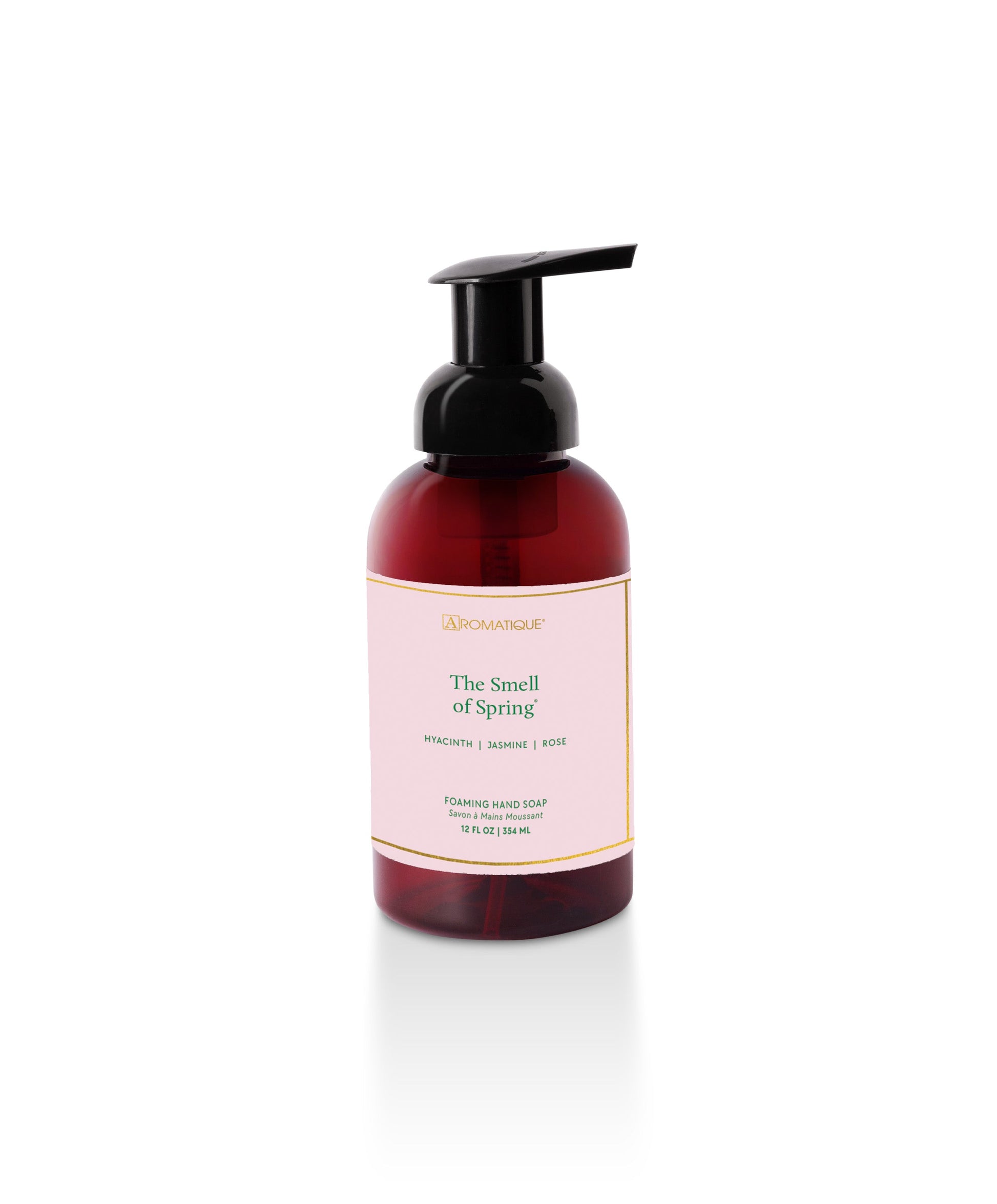 Hand soap bottle labeled 'The Smell of Spring' on a white background