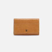 Brown leather wallet on a white background