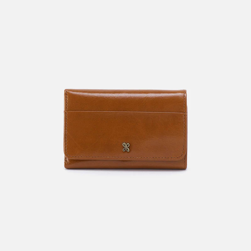 Brown leather wallet with a decorative clasp on a white background