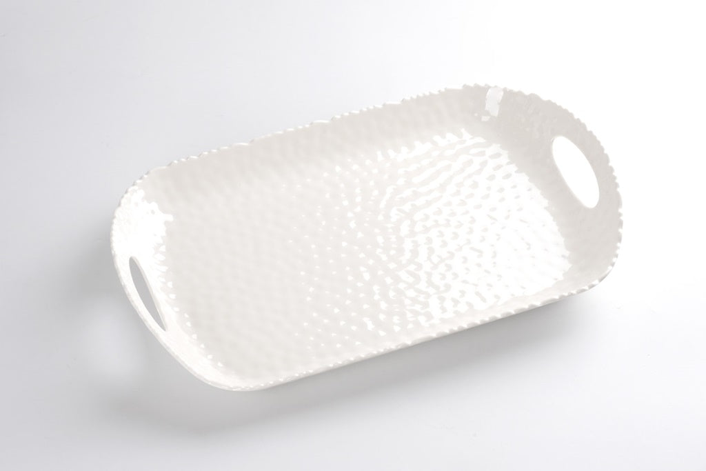 White textured Pampa bay melamine rectangular plate with handles on a light gray background