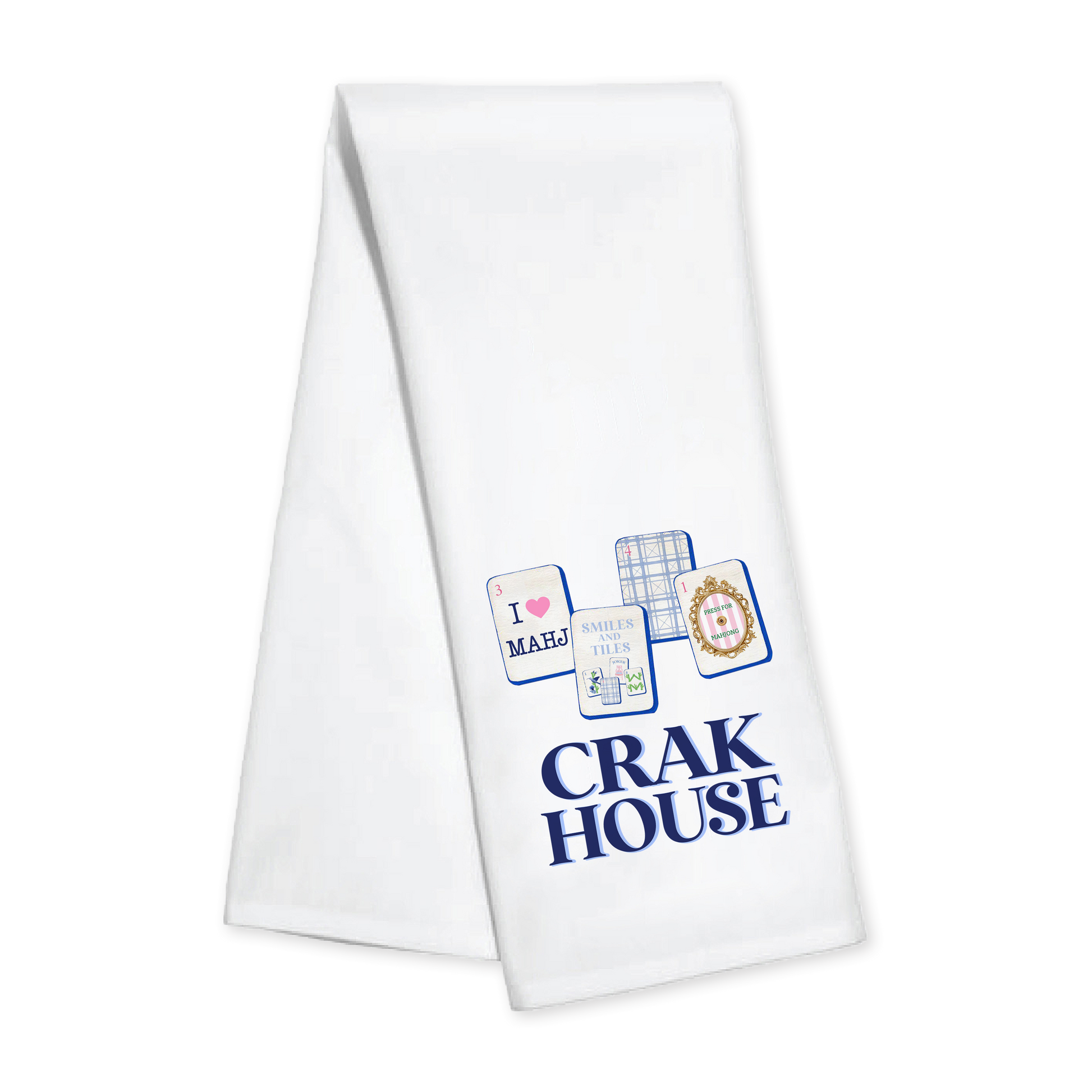 A Toss designs white kitchen towel with blue printed graphics and the text 'CRAK HOUSE' on a plain white background.ns 