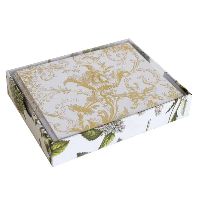 Decorative box of Anna Griffin note cards with gold floral pattern on a white background