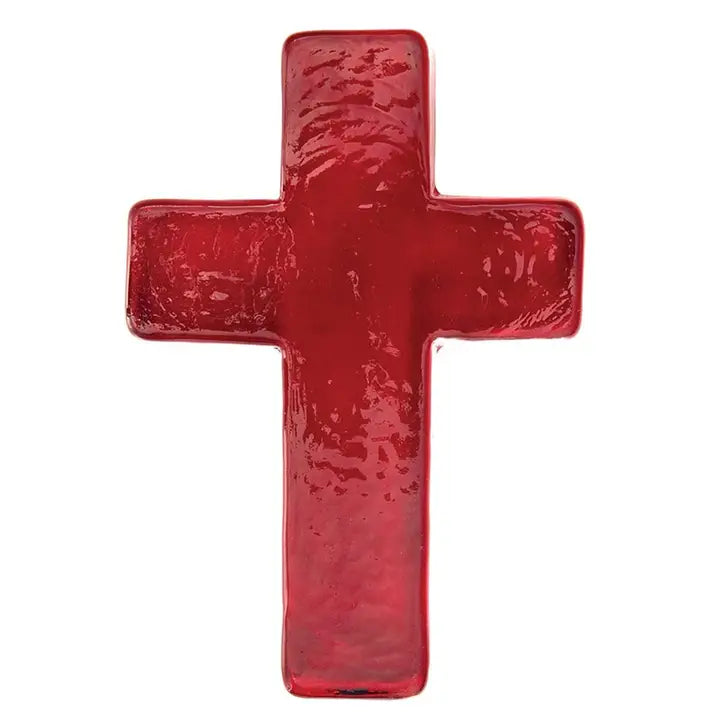 Red cross-shaped object on a white background
