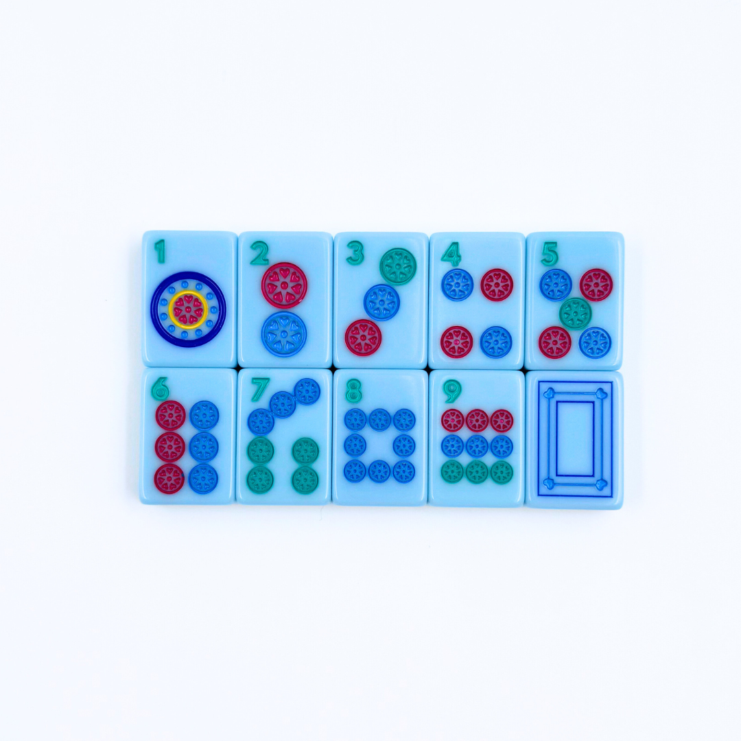Set of blue  Dots Mahjong tiles with colorful designs and numbers on a white background