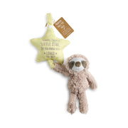 Plush sloth toy holding a star-shaped sign on a white background